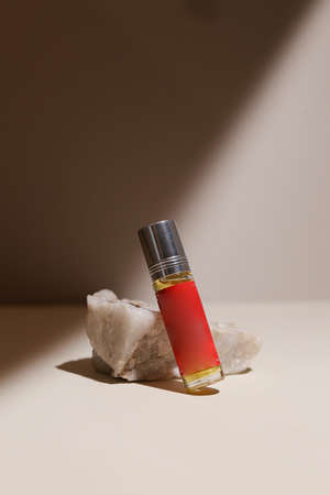 perfume bottle on the neutral modern backgroundの写真素材