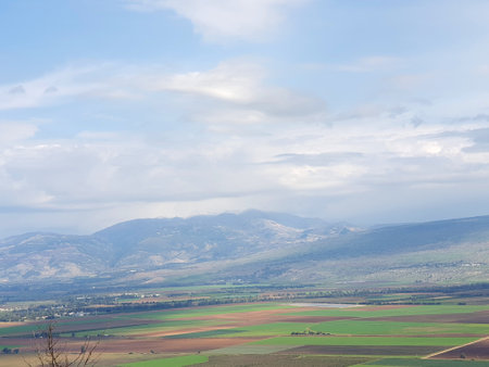 A view from Naftali mountains on the Hula valley, Golan heights and Mount Hermon with snow on top, Israel landscapeの写真素材