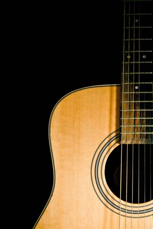 acoustic guitar on black background