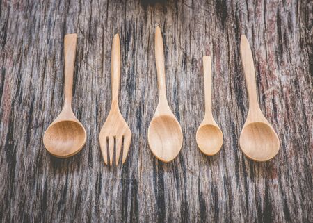 wood spoon on wood backgroundの写真素材