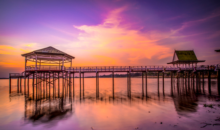 Wooden bridge in the sunsetの写真素材