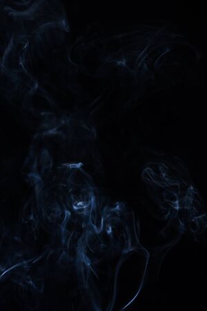 white smoke on black backgroundの写真素材