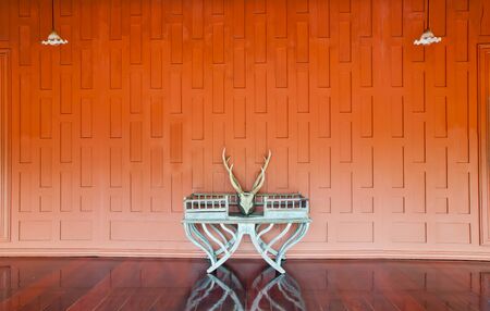 Thai style cap adorned with a seat on the back of an elephant and Antler の写真素材