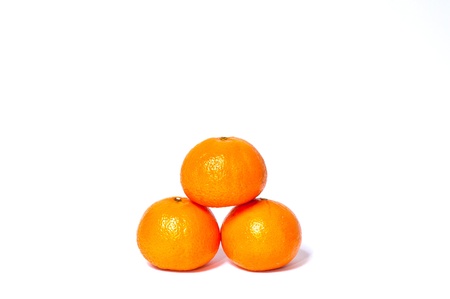 The three golden orange fruit の写真素材