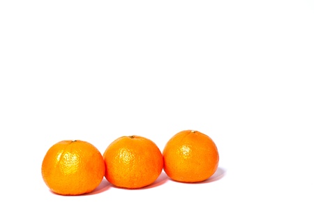 The three golden orange fruit の写真素材
