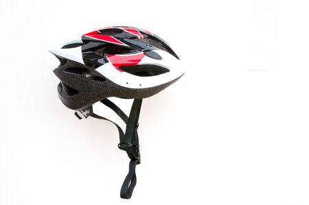 Bicycle helmet red white and black の写真素材