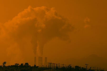Coal power plants causes air pollution の写真素材