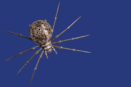 Puppets spider iron on blue background の写真素材