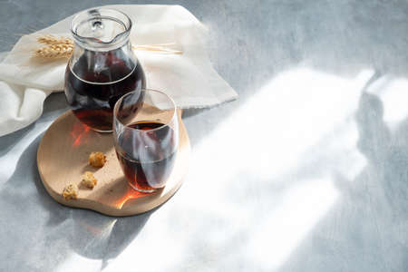 Traditional russian drink kvass made from bread, rye malt, sugar and water. kvass in bottle with rye...