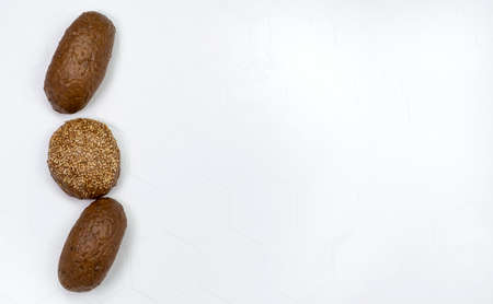 Long french baguette made from white flour, cools after baking isolated on white background.の写真素材