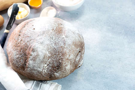 Delicious fresh rye bread on wooden background, horizontal orientationの写真素材