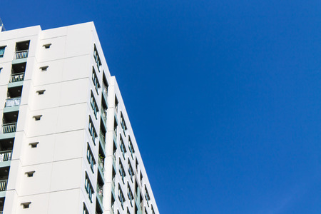 Condominium condominiums in Bangna, Bangkok, Thailand, viewed from below the blue sky.