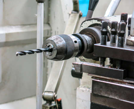 lathe drill chuck Properties are hardened steel with high strength. rusty brown It has been through hard use for a long time.の写真素材