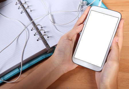 Touch screen mobile phone, in handの写真素材