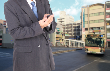 Double exposure of city and business manの写真素材