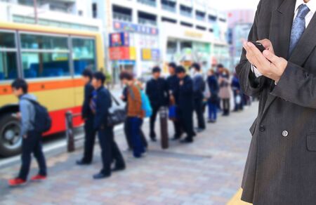 Double exposure of city and business manの写真素材