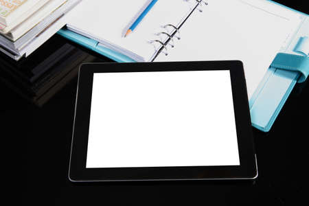 tablet pc on office tableの写真素材