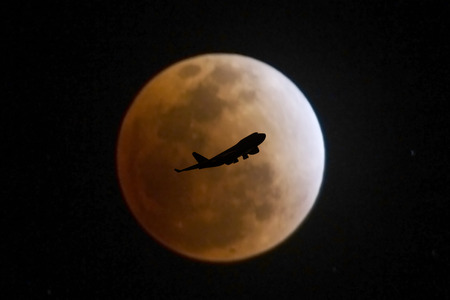 passenger plane on sky at sunset time very beautiful  use for air transport journey and travel industry businessの写真素材