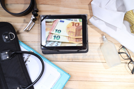 Overhead of essentials modern man. Outfit of business man on wood backgroundの写真素材