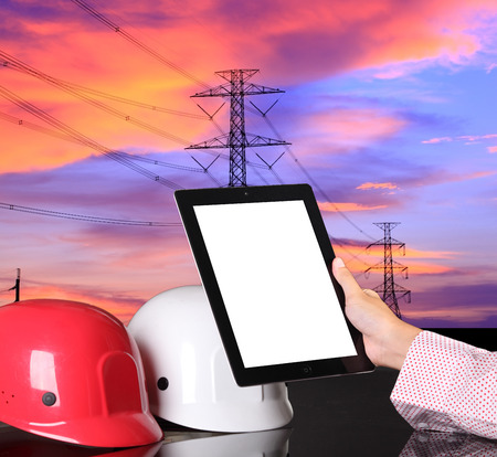 safety helmet on civil engineer working table and work area backgroundの写真素材