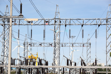 blue sky over an electrical substation.の写真素材