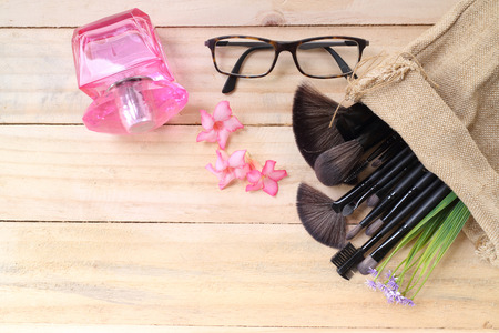 Various makeup products on dark background with copyspaceの写真素材