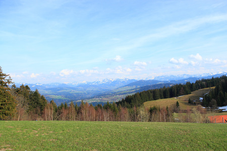 Panoramic view of beautiful mountain landscape in the Bavarian Alps with village of Berchtesgaden and Watzmann massif in the background at sunrise, Nationalpark Berchtesgadener Land, Bavaria, Germanyの写真素材