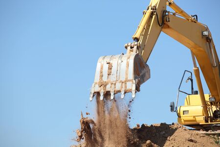 excavator in action  on siteの写真素材