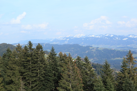 Panoramic view of beautiful mountain landscape in the Bavarian Alps with village of Berchtesgaden and Watzmann massif in the background at sunrise, Nationalpark Berchtesgadener Land, Bavaria, Germanyの写真素材