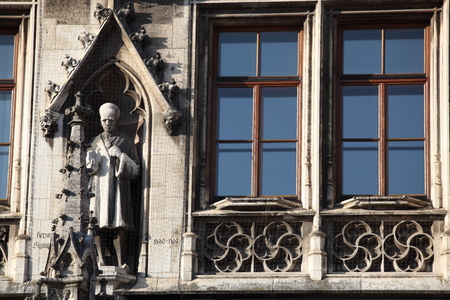 Medieval Town Hall building with spires Munich Germany. The first floor looks towards the Marienplatz- used for festivals and public events. The daily clock tower show is a tourist attraction.の写真素材