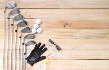 Golf equipment on wood floor preparing for good gameの写真素材
