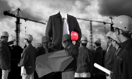 Professional engineer and a group of industrial workers. Construction.の写真素材