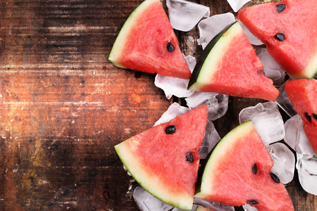 watermelon  yummy fresh summer fruit sweet dessert on vintage old wood tableの写真素材