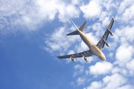 Airplane flying in the airの写真素材