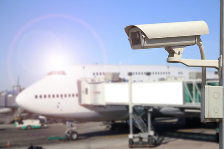 CCTV camera or surveillance operating in airportの写真素材