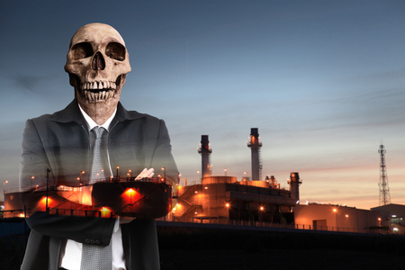skull businessman and industry backgroundの写真素材