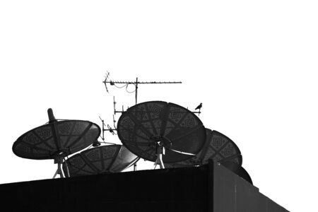 Communication transmission tower radio signal phone antenna or Telecommunication mast TV antennas or Satellite dishesの写真素材