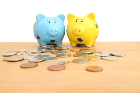 piggy bank on wooden table , saving,money concept.の写真素材