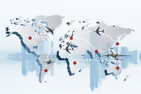 global transportation logistics or import export business concept or travel concept. Airplane flying and leave a white dashed trace line on world mapの写真素材