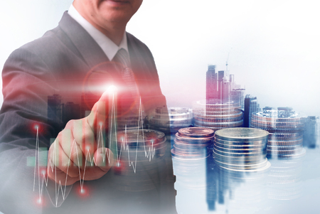 rows of coins for finance and banking concept with Forex graph on the  business background. A metaphor of international financial consulting ,Innovation Graphs Interfaces.Analyze market stock.の写真素材