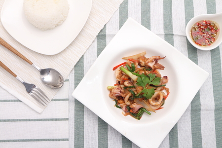 noddle tom yum seafood in white plateの写真素材