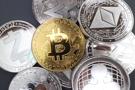 Cryptocurrency concept : Stack and piles of Bitcoin and other different cryptocurrencies  の写真素材