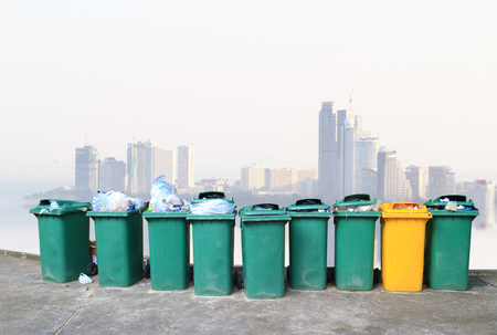 Colorful bins collection and city background の写真素材