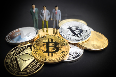 Cryptocurrency concept : Stack and piles of Bitcoin and other different cryptocurrenciesの写真素材