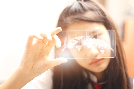 connection to around the world ,Intelligence  and business analytics with Website designer working digital tablet and smart phone.の写真素材