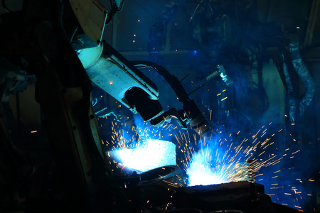 welding robot are working in automotive industry