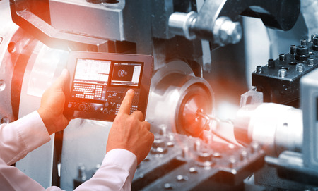 Industry 4.0 ,  concept  of Man hand holding cell phone or tablet with Augmented reality screen...