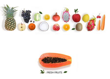Creative layout made of fruits. Flat lay. papaya, pineapple, lemon, orange, kiwi,coconut,dragon fruit,grape, Pomegranate, on the white background.の写真素材