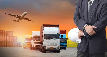 Double exposure of man with world map for logistic network distribution on background and Logistics Industrial Container Cargo freight ship for shipping and Transportation, import-exportの写真素材