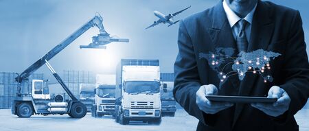The world logistics , there are world map with logistic network distribution on background and Logistics Industrial Container Cargo freight ship for Concept of fast or instant shippingの写真素材